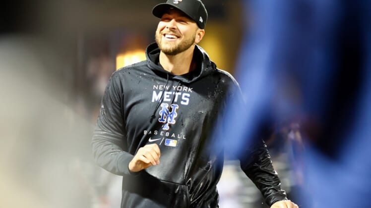 Apr 29, 2022; New York City, New York, USA; New York Mets relief pitcher Tylor Megill (38) smiles after his part in a combined no-hitter against the Philadelphia Phillies at Citi Field. Mandatory Credit: Jessica Alcheh-USA TODAY Sports