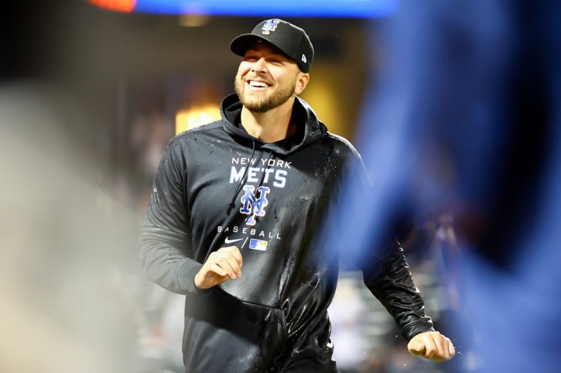 Apr 29, 2022; New York City, New York, USA; New York Mets relief pitcher Tylor Megill (38) smiles after his part in a combined no-hitter against the Philadelphia Phillies at Citi Field. Mandatory Credit: Jessica Alcheh-USA TODAY Sports