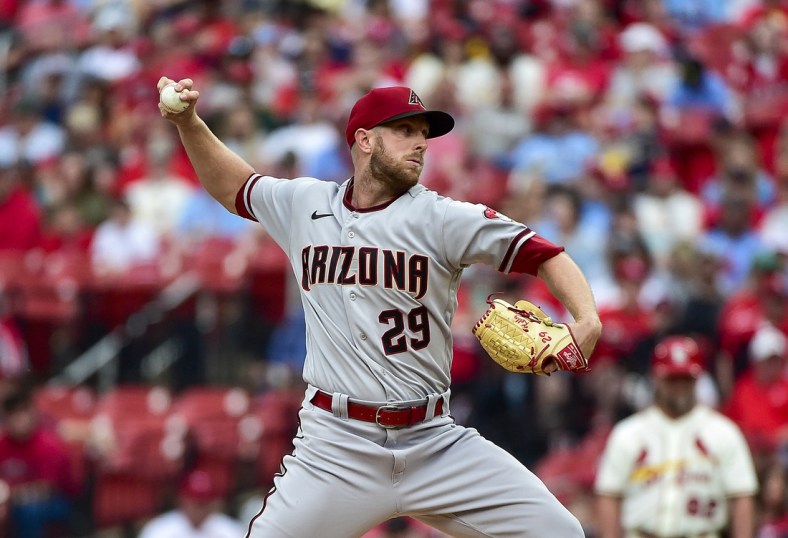 Apr 30, 2022; St. Louis, Missouri, USA;  Arizona Diamondbacks starting pitcher Merrill Kelly (29) pitches against the St. Louis Cardinals during the first inning at Busch Stadium. Mandatory Credit: Jeff Curry-USA TODAY Sports