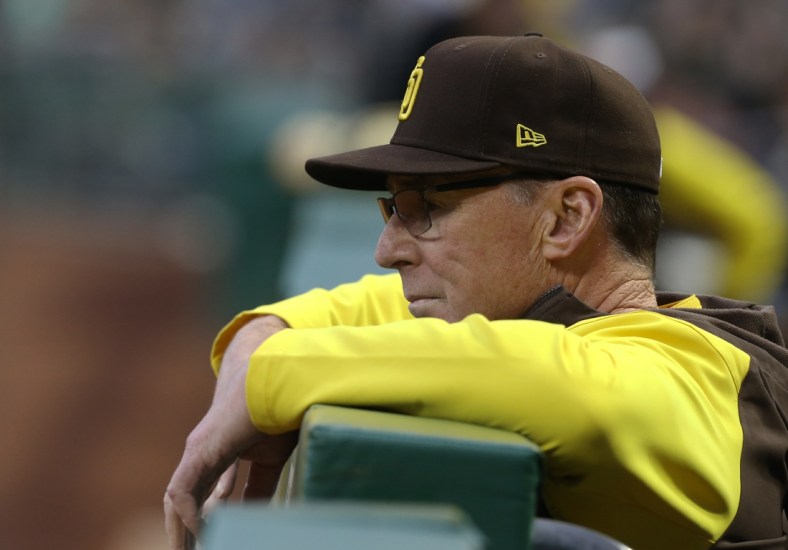 Apr 30, 2022; Pittsburgh, Pennsylvania, USA;  San Diego Padres manager Bob Melvin (3) looks on over he dugout rail against the Pittsburgh Pirates during the fourth inning at PNC Park. Mandatory Credit: Charles LeClaire-USA TODAY Sports