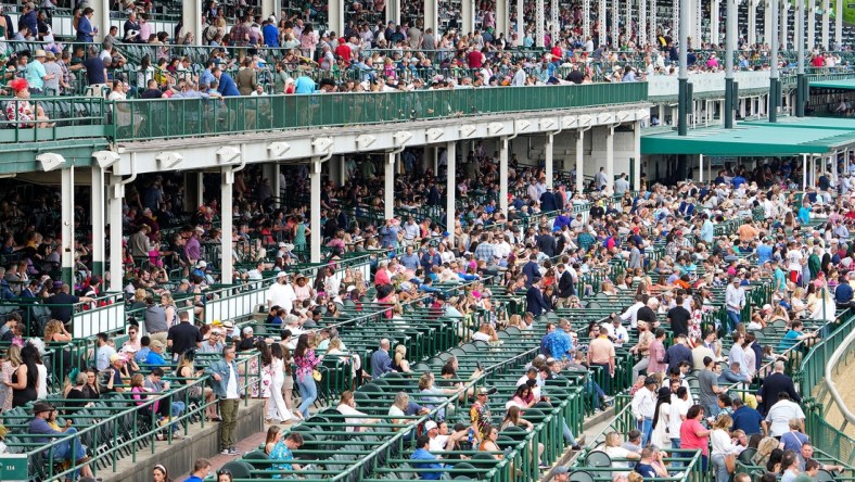 The crowd in the grandstands on opening night at Churchill Downs on Saturday, April 30, 2022

Openingnight10