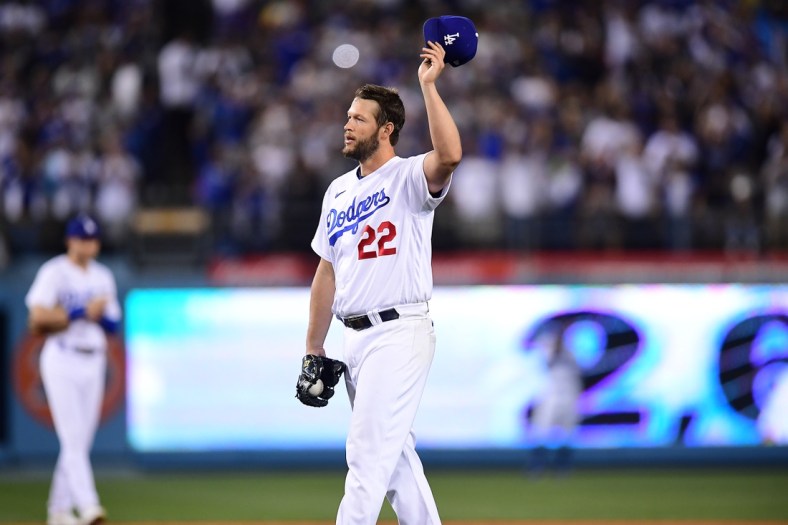 Apr 30, 2022; Los Angeles, California, USA; Los Angeles Dodgers starting pitcher Clayton Kershaw (22) acknowledges fans after striking out Detroit Tigers first baseman Spencer Torkelson (20) during the fourth inning at Dodger Stadium. The strikeout is the 2,697th of Kershaw   s career and puts him above former pitcher Don Sutton for most career strikeouts all time with the Dodgers. Mandatory Credit: Gary A. Vasquez-USA TODAY Sports