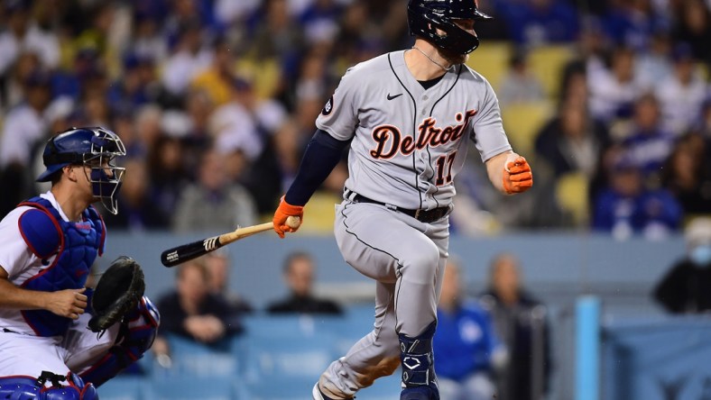 Apr 30, 2022; Los Angeles, California, USA; Detroit Tigers right fielder Austin Meadows (17) hits a two run RBI single against the Los Angeles Dodgers during the seventh inning at Dodger Stadium. Mandatory Credit: Gary A. Vasquez-USA TODAY Sports