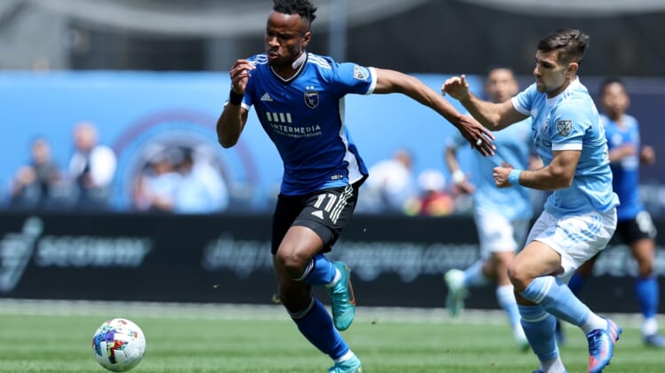 May 1, 2022; New York, New York, USA; San Jose Earthquakes forward Jeremy Ebobisse (11) plays the ball against New York City FC midfielder Nicolas Acevedo (26) during the first half at Yankee Stadium. Mandatory Credit: Brad Penner-USA TODAY Sports