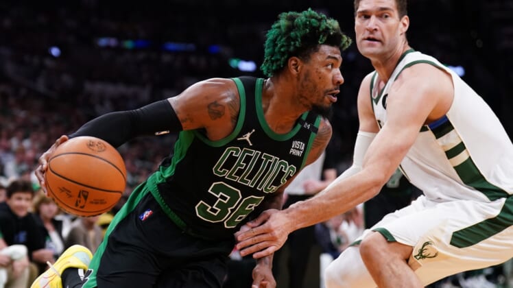 May 1, 2022; Boston, Massachusetts, USA; Boston Celtics guard Marcus Smart (36) drives the ball against the Milwaukee Bucks in the first quarter during game one of the second round for the 2022 NBA playoffs at TD Garden. Mandatory Credit: David Butler II-USA TODAY Sports