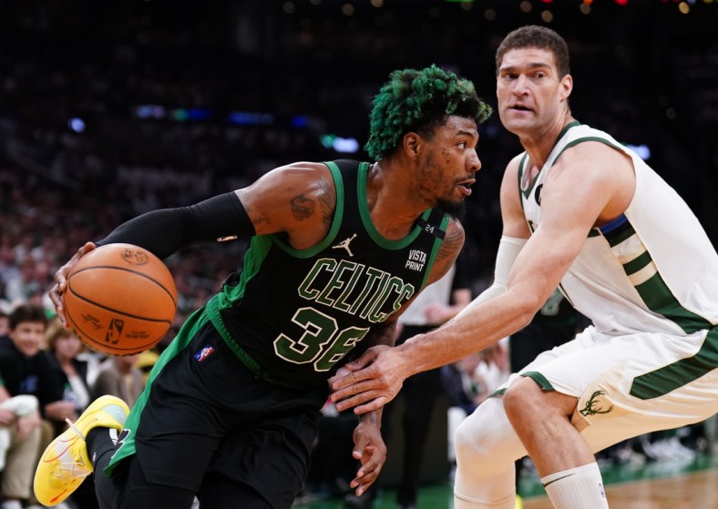 May 1, 2022; Boston, Massachusetts, USA; Boston Celtics guard Marcus Smart (36) drives the ball against the Milwaukee Bucks in the first quarter during game one of the second round for the 2022 NBA playoffs at TD Garden. Mandatory Credit: David Butler II-USA TODAY Sports