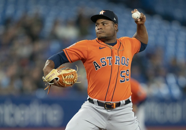 May 1, 2022; Toronto, Ontario, CAN; Houston Astros starting pitcher Framber Valdez (59) throws a pitch during first inning against the Toronto Blue Jays at Rogers Centre. Mandatory Credit: Nick Turchiaro-USA TODAY Sports