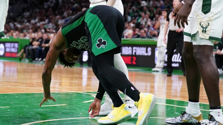 May 1, 2022; Boston, Massachusetts, USA; Boston Celtics guard Marcus Smart (36) is hurt during a play against Milwaukee Bucks guard Pat Connaughton (24) in the second quarter during game one of the second round for the 2022 NBA playoffs at TD Garden. Mandatory Credit: David Butler II-USA TODAY Sports