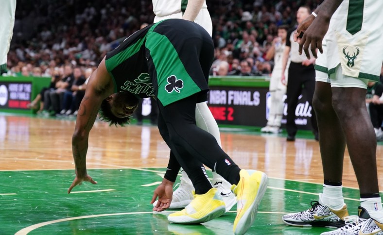 May 1, 2022; Boston, Massachusetts, USA; Boston Celtics guard Marcus Smart (36) is hurt during a play against Milwaukee Bucks guard Pat Connaughton (24) in the second quarter during game one of the second round for the 2022 NBA playoffs at TD Garden. Mandatory Credit: David Butler II-USA TODAY Sports
