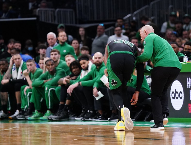 May 1, 2022; Boston, Massachusetts, USA; Boston Celtics guard Marcus Smart (36) is hurt during a play against the Milwaukee Bucks in the second quarter during game one of the second round for the 2022 NBA playoffs at TD Garden. Mandatory Credit: David Butler II-USA TODAY Sports