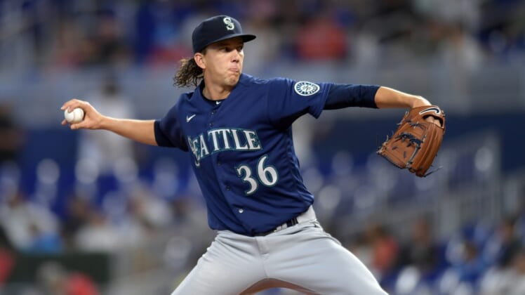 May 1, 2022; Miami, Florida, USA; Seattle Mariners starting pitcher Logan Gilbert (36) delivers against the Miami Marlins in the first inning at loanDepot Park. Mandatory Credit: Jim Rassol-USA TODAY Sports
