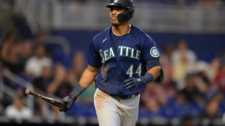 May 1, 2022; Miami, Florida, USA; Seattle Mariners center fielder Julio Rodriguez (44) tosses his bat aside after hitting a three-run home run against the Miami Marlins in the sixth inning at loanDepot Park. Mandatory Credit: Jim Rassol-USA TODAY Sports