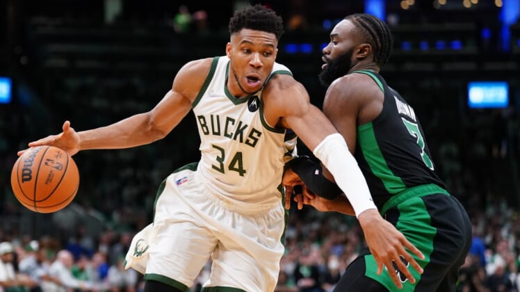 May 1, 2022; Boston, Massachusetts, USA; Milwaukee Bucks forward Giannis Antetokounmpo (34) drives the ball against Boston Celtics guard Jaylen Brown (7) in the second half during game one of the second round for the 2022 NBA playoffs at TD Garden. Mandatory Credit: David Butler II-USA TODAY Sports