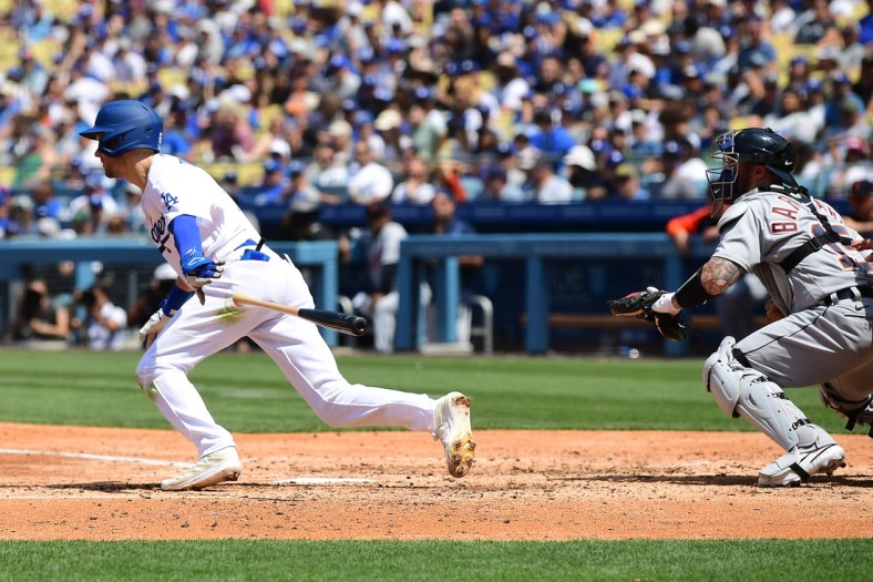 May 1, 2022; Los Angeles, California, USA; Los Angeles Dodgers shortstop Trea Turner (6) hits a sacrifice RBI against the Detroit Tigers during the second inning at Dodger Stadium. Mandatory Credit: Gary A. Vasquez-USA TODAY Sports