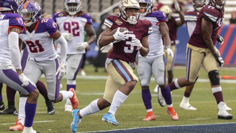 May 1, 2022; Birmingham, AL, USA; Michigan Panthers running back Reggie Corbin (3) runs the ball for a touchdown against the Pittsburgh Maulers during the second half at Protective Stadium. Mandatory Credit: Vasha Hunt-USA TODAY Sports