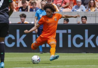 Apr 30, 2022; Houston, Texas, USA; Houston Dynamo FC midfielder Adalberto Carrasquilla (20) in action during the match against the Austin FC at PNC Stadium. Mandatory Credit: Troy Taormina-USA TODAY Sports