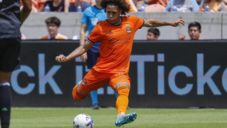 Apr 30, 2022; Houston, Texas, USA; Houston Dynamo FC midfielder Adalberto Carrasquilla (20) in action during the match against the Austin FC at PNC Stadium. Mandatory Credit: Troy Taormina-USA TODAY Sports