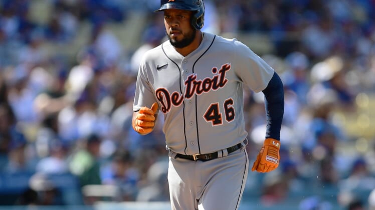 May 1, 2022; Los Angeles, California, USA; Detroit Tigers third baseman Jeimer Candelario (46) reaches home after hitting a solo home run against the Los Angeles Dodgers during the ninth inning at Dodger Stadium. Mandatory Credit: Gary A. Vasquez-USA TODAY Sports
