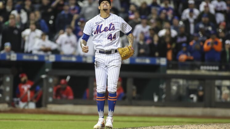 May 1, 2022; New York City, New York, USA;  New York Mets pitcher Yoan Lopez (44) races after hitting a batter in the ninth inning against the Philadelphia Phillies at Citi Field. Mandatory Credit: Wendell Cruz-USA TODAY Sports