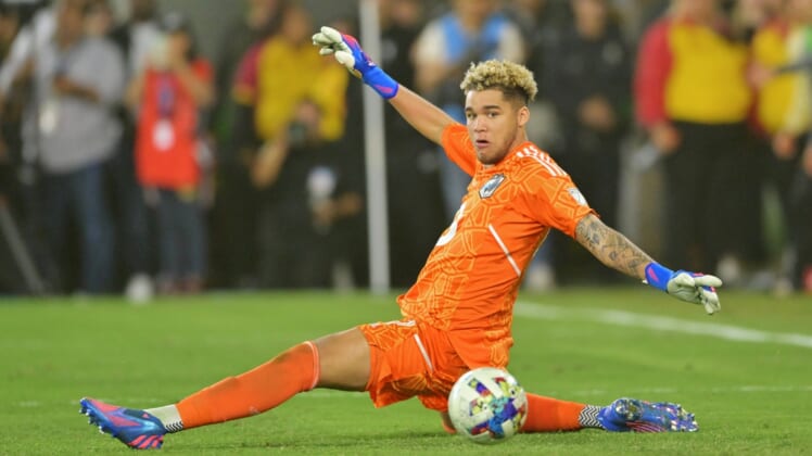 May 1, 2022; Los Angeles, California, USA; Minnesota United goalkeeper Dayne St. Clair (97) tries to block a shot during the second half against Los Angeles FC at Banc of California Stadium. Mandatory Credit: Jayne Kamin-Oncea-USA TODAY Sports