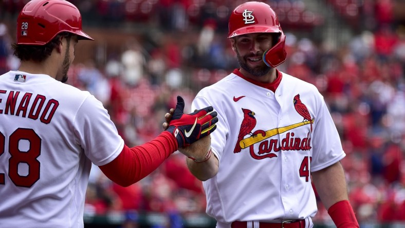 May 2, 2022; St. Louis, Missouri, USA;  St. Louis Cardinals first baseman Paul Goldschmidt (46) celebrates with third baseman Nolan Arenado (28) after hitting a solo home run against the Kansas City Royals during the first inning at Busch Stadium. Mandatory Credit: Jeff Curry-USA TODAY Sports