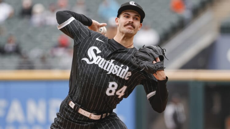 May 2, 2022; Chicago, Illinois, USA; Chicago White Sox starting pitcher Dylan Cease (84) delivers against the Los Angeles Angels during the first inning at Guaranteed Rate Field. Mandatory Credit: Kamil Krzaczynski-USA TODAY Sports