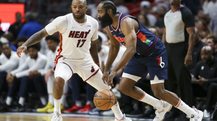 May 2, 2022; Miami, Florida, USA; Philadelphia 76ers guard James Harden (1) dribbles the basketball as Miami Heat forward P.J. Tucker (17) defends in the first quarter during game one of the second round for the 2022 NBA playoffs at FTX Arena. Mandatory Credit: Sam Navarro-USA TODAY Sports