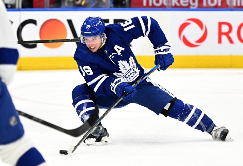 May 2, 2022; Toronto, Ontario, CAN;  Toronto Maple Leafs forward Mitchell Marner (16) skates with the puck against the Tampa Bay Lightning in game one of the first round of the 2022 Stanley Cup Playoffs at Scotiabank Arena. Mandatory Credit: Dan Hamilton-USA TODAY Sports