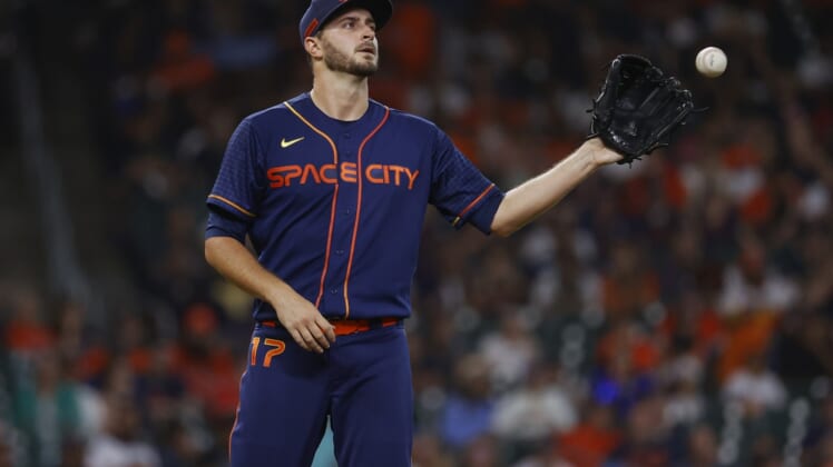 May 2, 2022; Houston, Texas, USA; Houston Astros starting pitcher Jake Odorizzi (17) reacts after a pitch during the second inning against the Seattle Mariners at Minute Maid Park. Mandatory Credit: Troy Taormina-USA TODAY Sports