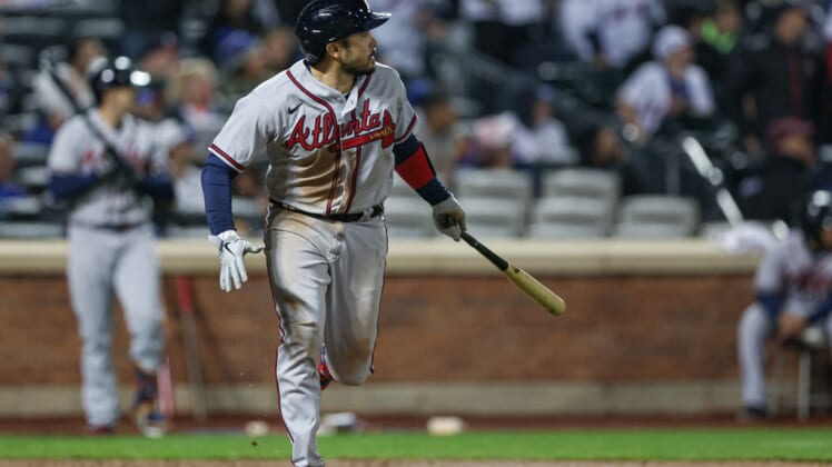 May 2, 2022; New York City, New York, USA; Atlanta Braves catcher Travis d'Arnaud (16) looks up at his two RBI double during the eighth inning against the New York Mets at Citi Field. Mandatory Credit: Vincent Carchietta-USA TODAY Sports