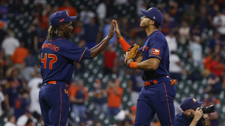 May 2, 2022; Houston, Texas, USA; Houston Astros relief pitcher Rafael Montero (47) celebrates with shortstop Jeremy Pena (3) after the Astros defeated the Seattle Mariners at Minute Maid Park. Mandatory Credit: Troy Taormina-USA TODAY Sports