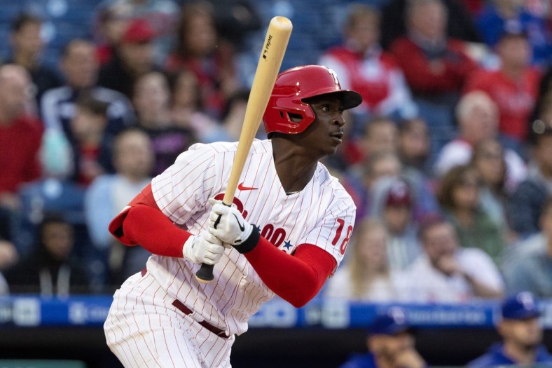 May 3, 2022; Philadelphia, Pennsylvania, USA; Philadelphia Phillies shortstop Didi Gregorius (18) hits an RBI single during the first inning against the Texas Rangers at Citizens Bank Park. Mandatory Credit: Bill Streicher-USA TODAY Sports