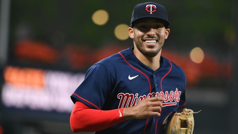 May 3, 2022; Baltimore, Maryland, USA;  Minnesota Twins shortstop Carlos Correa (4) runs off the field after the second inning against the Baltimore Orioles at Oriole Park at Camden Yards. Mandatory Credit: Tommy Gilligan-USA TODAY Sports