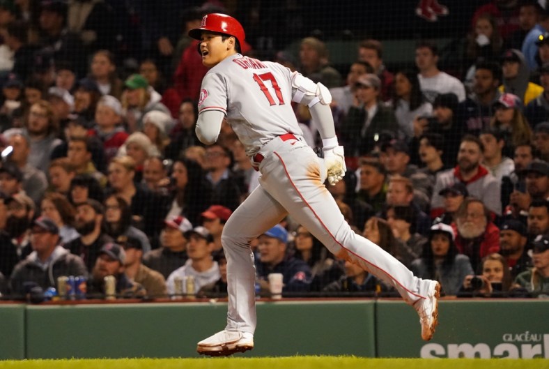 May 3, 2022; Boston, Massachusetts, USA; Los Angeles Angels designated hitter Shohei Ohtani (17) watches his line drive out to left field against the Boston Red Sox in the sixth inning at Fenway Park. Mandatory Credit: David Butler II-USA TODAY Sports