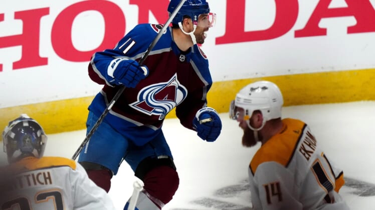 May 3, 2022; Denver, Colorado, USA; Colorado Avalanche center Andrew Cogliano (11) celebrates his goal in the first period of game one against the Nashville Predators of the first round of the 2022 Stanley Cup Playoffs at Ball Arena. Mandatory Credit: Ron Chenoy-USA TODAY Sports