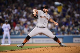 May 3, 2022; Los Angeles, California, USA; San Francisco Giants starting pitcher Carlos Rodon (16) throws against the Los Angeles Dodgers during the fourth inning at Dodger Stadium. Mandatory Credit: Gary A. Vasquez-USA TODAY Sports