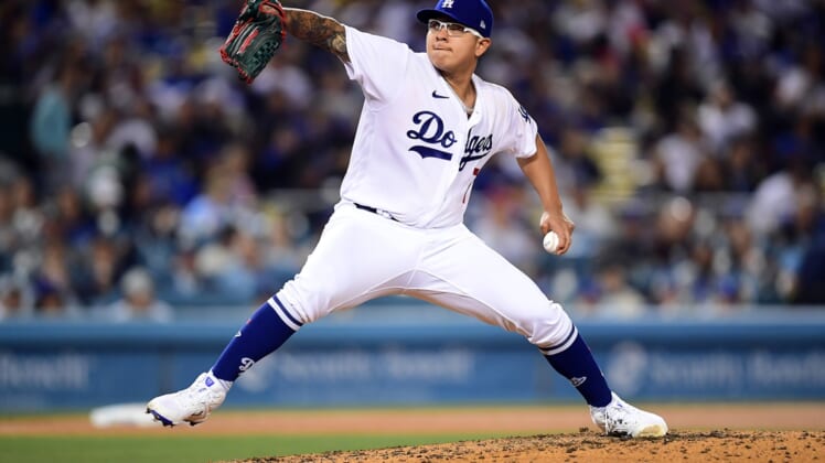 May 3, 2022; Los Angeles, California, USA; Los Angeles Dodgers starting pitcher Julio Urias (7) throws against the San Francisco Giants during the fifth inning at Dodger Stadium. Mandatory Credit: Gary A. Vasquez-USA TODAY Sports