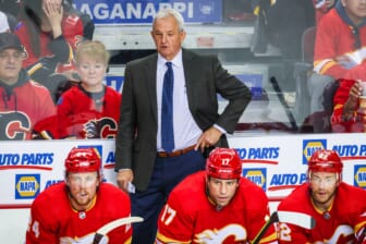 May 3, 2022; Calgary, Alberta, CAN; Calgary Flames head coach Darryl Sutter on his bench against the Dallas Stars during the second period in game one of the first round of the 2022 Stanley Cup Playoffs at Scotiabank Saddledome. Mandatory Credit: Sergei Belski-USA TODAY Sports