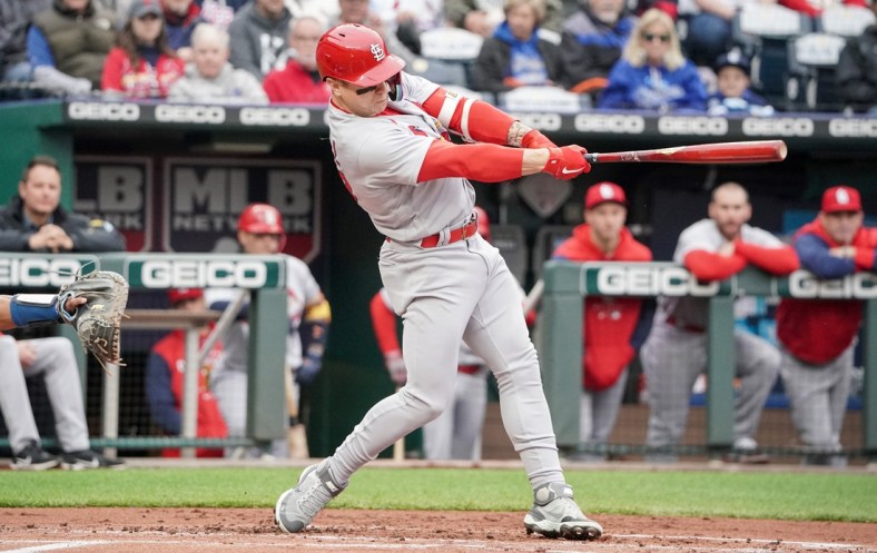 May 4, 2022; Kansas City, Missouri, USA; St. Louis Cardinals left fielder Tyler O'Neill (27) hits a triple against the Kansas City Royals in the first inning at Kauffman Stadium. Mandatory Credit: Denny Medley-USA TODAY Sports