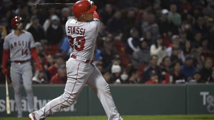 May 4, 2022; Boston, Massachusetts, USA;  Los Angeles Angels catcher Max Stassi (33) hits a two run home run during the fifth inning against the Boston Red Sox at Fenway Park. Mandatory Credit: Bob DeChiara-USA TODAY Sports