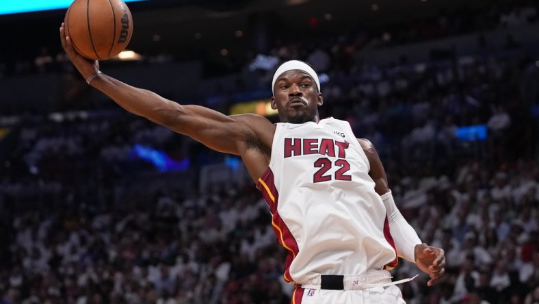 May 4, 2022; Miami, Florida, USA; Miami Heat forward Jimmy Butler (22) rebounds the ball during first half in game two of the second round for the 2022 NBA playoffs against the Philadelphia 76ers at FTX Arena. Mandatory Credit: Jasen Vinlove-USA TODAY Sports