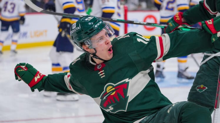 May 4, 2022; Saint Paul, Minnesota, USA; Minnesota Wild center Joel Eriksson Ek (14) celebrates his goal against the St. Louis Blues in the second period in game two of the first round of the 2022 Stanley Cup Playoffs at Xcel Energy Center. Mandatory Credit: Brad Rempel-USA TODAY Sports