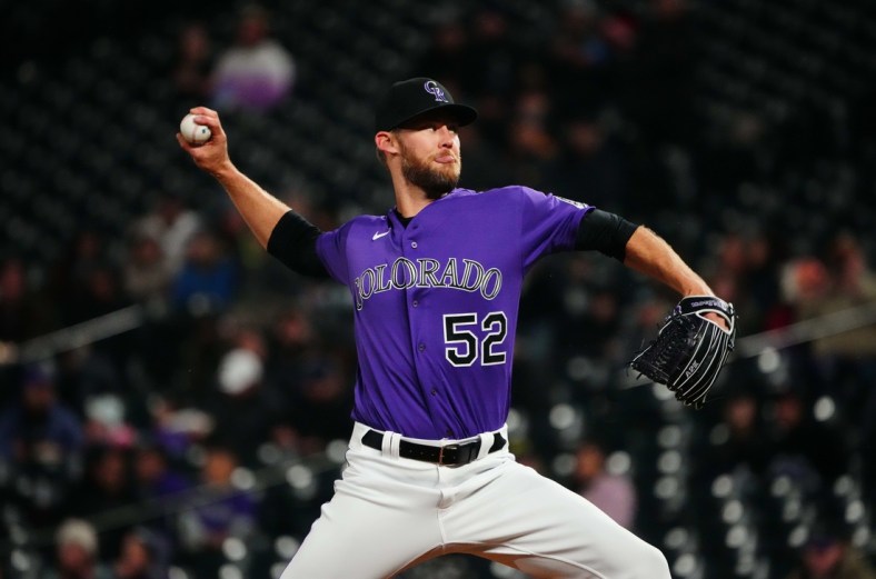 May 4, 2022; Denver, Colorado, USA; Colorado Rockies relief pitcher Daniel Bard (52) delivers a pitch in the ninth inning against the Washington Nationals at Coors Field. Mandatory Credit: Ron Chenoy-USA TODAY Sports
