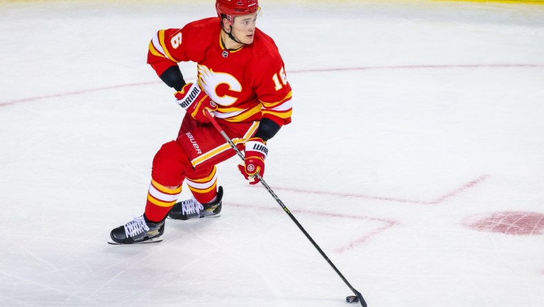 May 3, 2022; Calgary, Alberta, CAN; Calgary Flames defenseman Nikita Zadorov (16) skates with the puck against the Dallas Stars during the second period in game one of the first round of the 2022 Stanley Cup Playoffs at Scotiabank Saddledome. Mandatory Credit: Sergei Belski-USA TODAY Sports