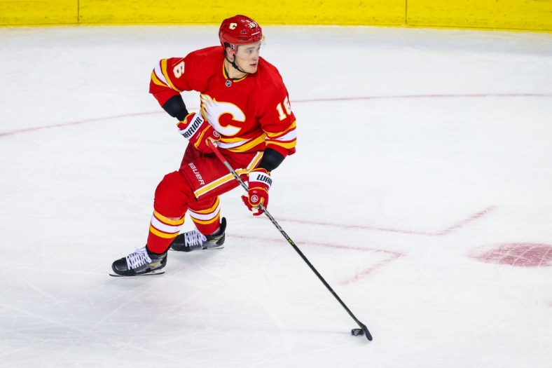 May 3, 2022; Calgary, Alberta, CAN; Calgary Flames defenseman Nikita Zadorov (16) skates with the puck against the Dallas Stars during the second period in game one of the first round of the 2022 Stanley Cup Playoffs at Scotiabank Saddledome. Mandatory Credit: Sergei Belski-USA TODAY Sports