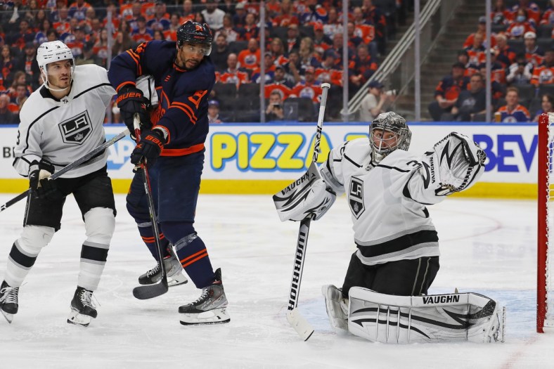 May 4, 2022; Edmonton, Alberta, CAN; Edmonton Oilers forward Evander Kane (91) tips a shot just wide of Los Angeles Kings goaltender Jonathan Quick (32) during the third period in game two of the first round of the 2022 Stanley Cup Playoffs at Rogers Place. Mandatory Credit: Perry Nelson-USA TODAY Sports