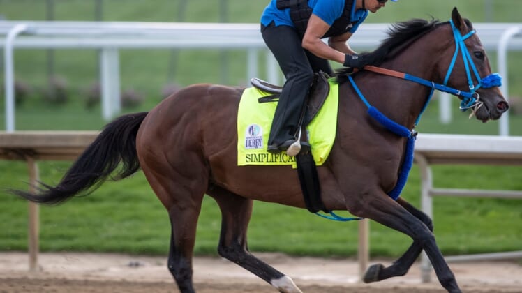 Kentucky Derby hopeful Simplification gallops on the track at Churchill Downs. May 4, 2022Af5i3169