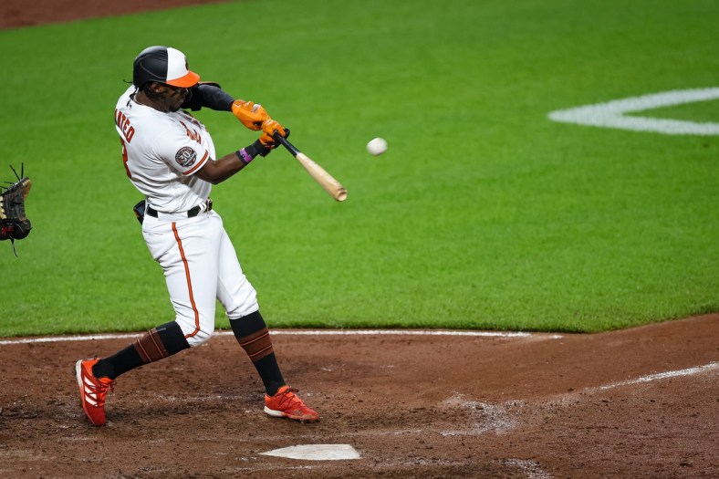 May 5, 2022; Baltimore, Maryland, USA; Baltimore Orioles shortstop Jorge Mateo (3) hits a home run against the Minnesota Twins during the fifth inning at Oriole Park at Camden Yards. Mandatory Credit: Scott Taetsch-USA TODAY Sports