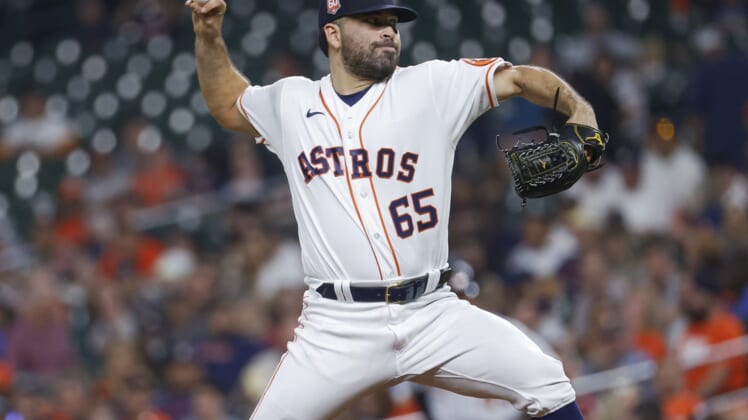 May 5, 2022; Houston, Texas, USA; Houston Astros starting pitcher Jose Urquidy (65) delivers a pitch during the sixth inning against the Detroit Tigers at Minute Maid Park. Mandatory Credit: Troy Taormina-USA TODAY Sports