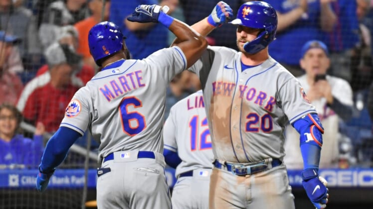 May 5, 2022; Philadelphia, Pennsylvania, USA; New York Mets right fielder Starling Marte (6) and designated hitter Pete Alonso (20) celebrate against the Philadelphia Phillies during the ninth inning at Citizens Bank Park. Mandatory Credit: Eric Hartline-USA TODAY Sports
